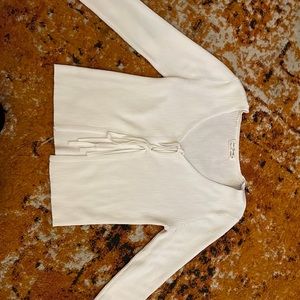 I’m selling a long sleeve tied shirt size medium worn like twice